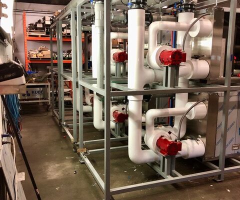 Heat exchanger skids for an ice rink installation insulated with Urethane and Armaflex with PVC jacketing.