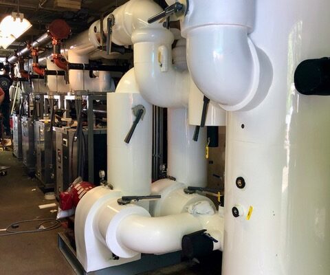 Ice rink piping and equipment insulation.